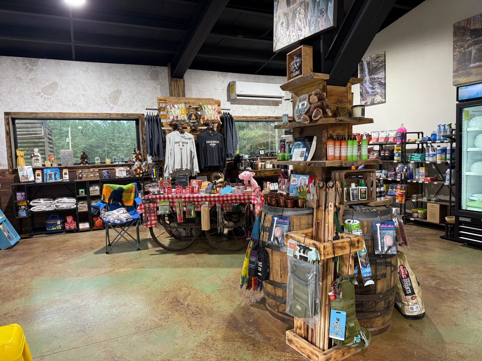 Shelves of snacks, drinks, and camping essentials inside Piggy's Store